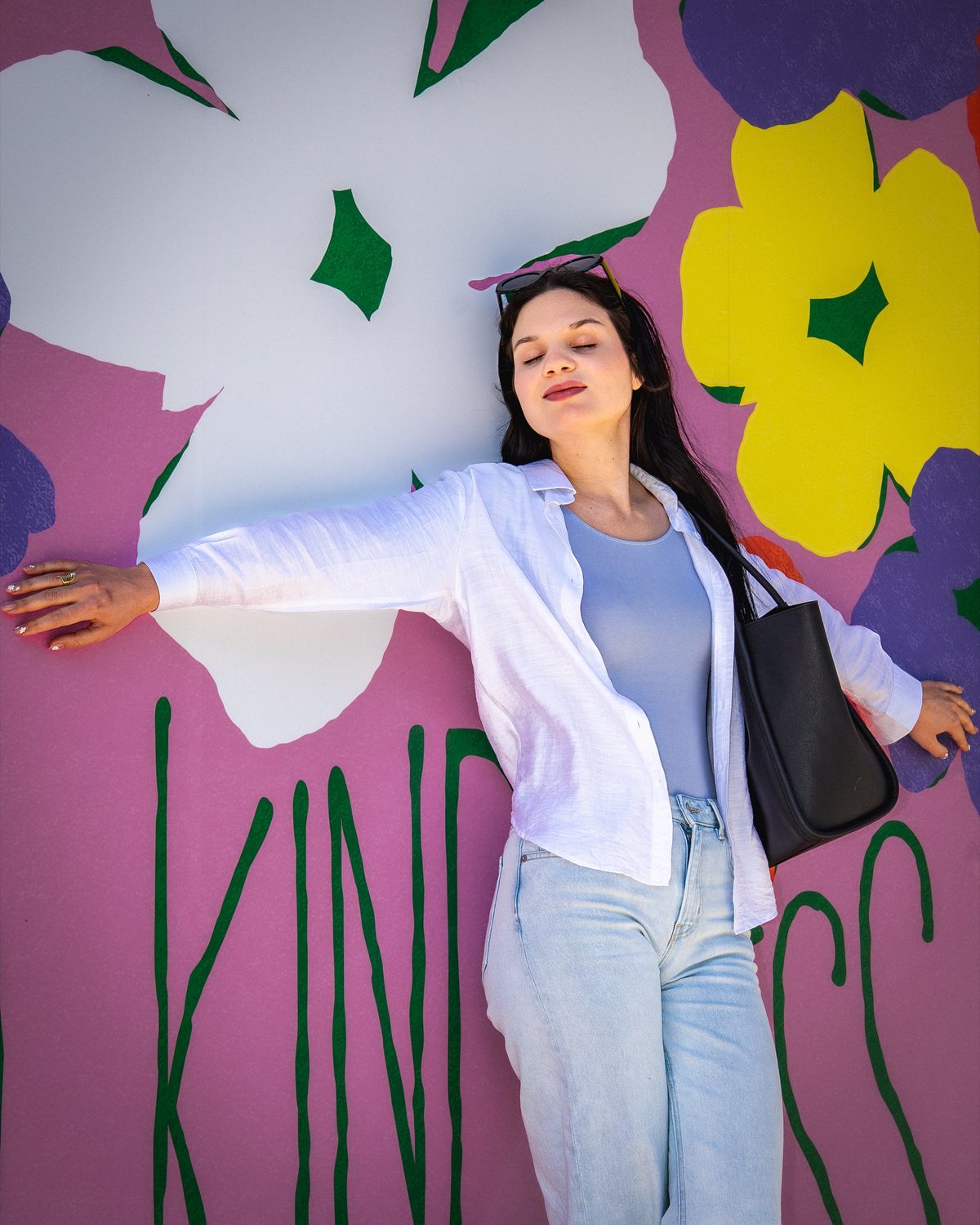 Lifestyle portrait at Austin mural — natural light photography